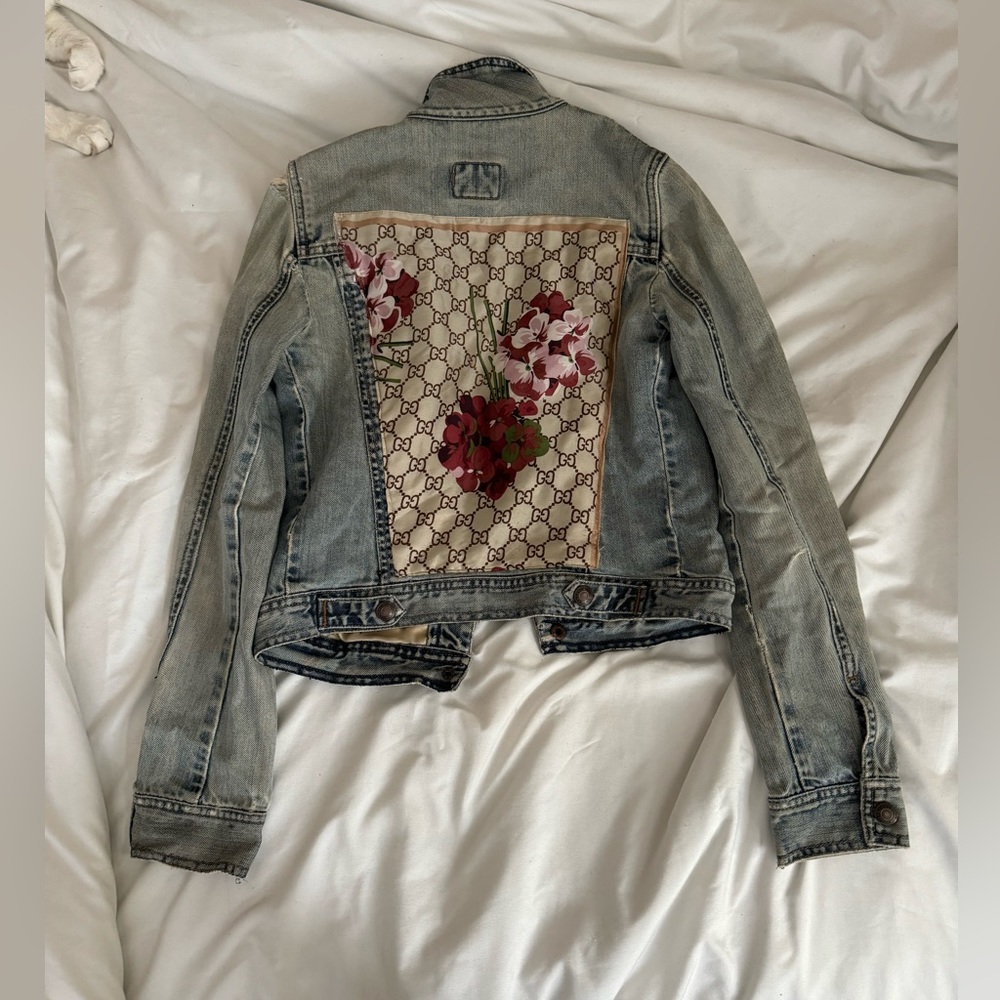 Denim jacket with authentic Gucci scarf as detail in the back.